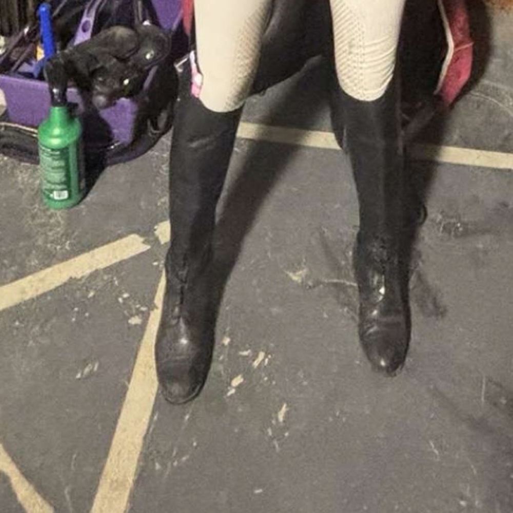 Black tall boots.